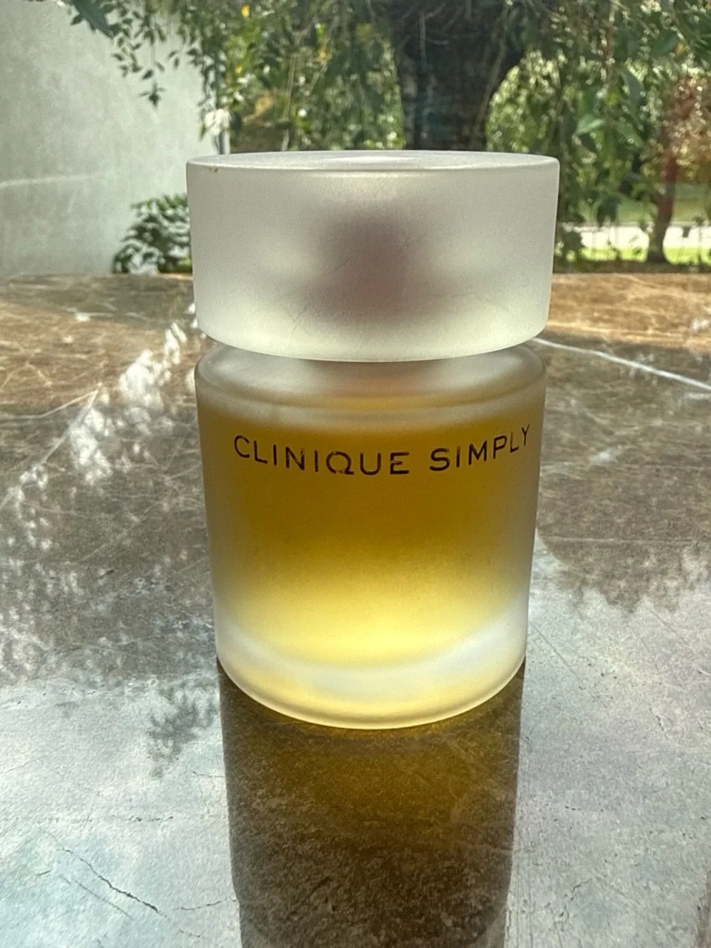 Clinique Simply Facial Oil — Frosted White Cap with Golden Oil